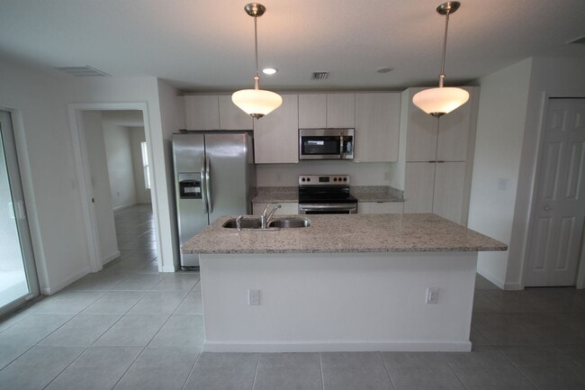 Photo - Stunning 4BR/2BA Palm Bay Retreat with Modern Upgrades & Oversized Lot!!