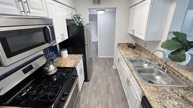 Our galley-style kitchens inspire culinary delight, inviting you to fall in love with the art of cooking.