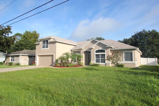 Photo - Huge 4 Bed 3 Bath Home w FENCED YARD and SCREENED LANAI for Rent!