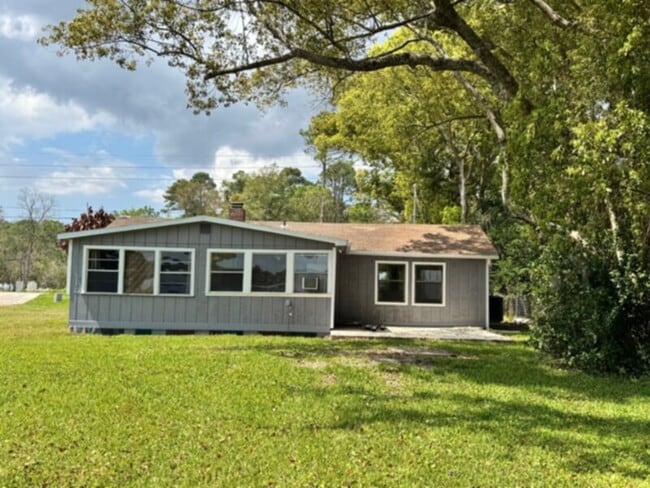 Photo - Beautiful 2 Bedroom, 1 Bath Lake Front Home with Den and Oversized 2 Car Garage on Large Lot