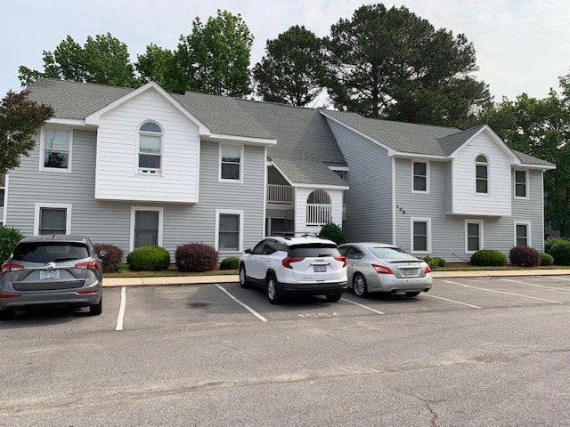 Building Photo - "Charming 2-Bed Condo Oasis with Fireplace... Unit B