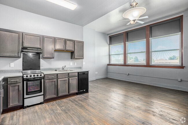 2BR, 1BA - 749SF - Kitchen & Living Room - Dunbar Commons