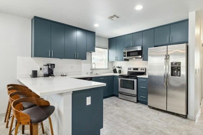 Photo - Utilities Included (a $200+ Savings). Charming Updated Duplex Home in Historic District!