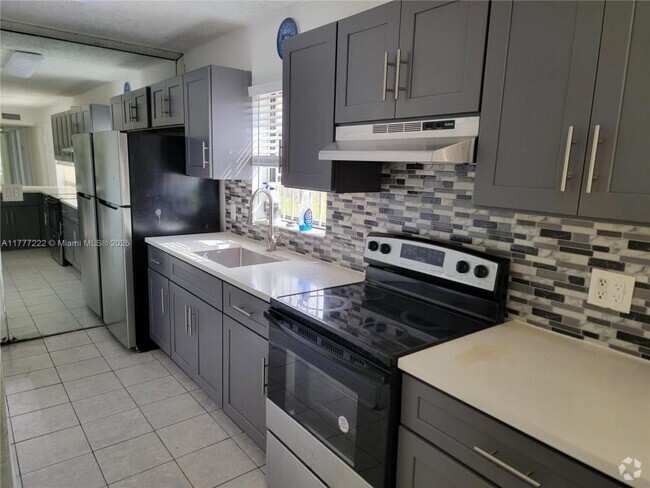 Building Photo - 3 bedroom in Miami Gardens FL 33056 Rental