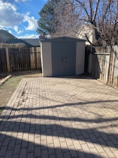 raised paver patio (not covered) w/shed - 7245 Wallsend Dr