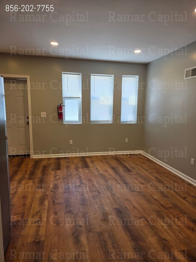 Photo - Charming 3-Bedroom Home with Spacious Gated Yard