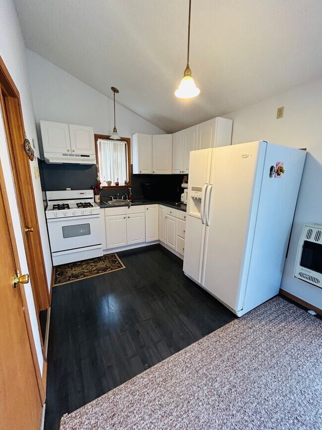 Photo - Bright and spacious 3-bedroom, 1-bath home featuring a nice backyard