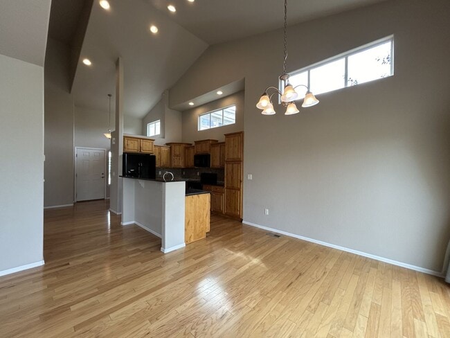 Photo - $500 Off First Month Of Rent! Modern 3BR Townhome with Fenced Yard & Garage