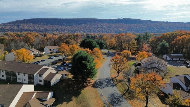 Embrace the serene beauty of The Residences at Talcott, an Eagle Rock Community, where vibrant fall foliage meets comfortable living. Enjoy spacious layouts in a tranquil setting. Schedule your visit today and find your new home!