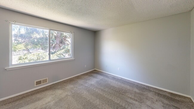 2BR, 1.5BA - 1,100SF - Primary Bedroom