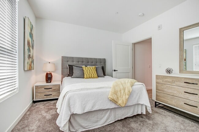 Bedroom with carpeting