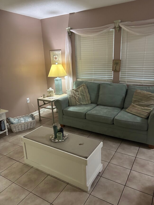 Cozy living room with TV - 614 4th Ave S