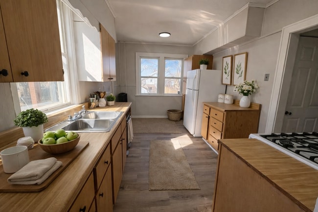 Photo - Newly Renovated 5-Bedroom Akron Home with Huge Deck + Fenced Yard