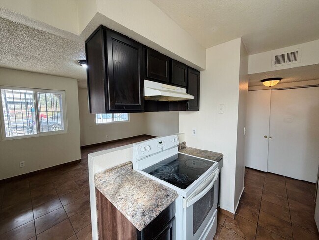 Photo - **TWO WEEKS FREE RENT!! ACCEPTS SECTION 8!!** Spacious first floor apartment with large living ro... Unit 2420 Ellis St #A