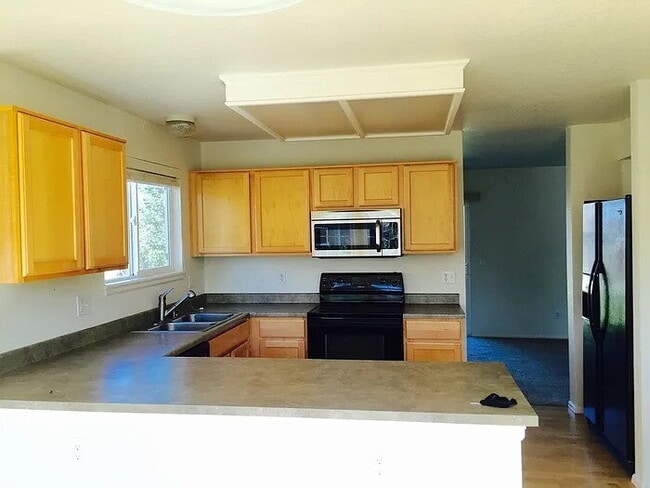 Photo - "Spacious 4-Bed Retreat in Parker, CO - Yo...
