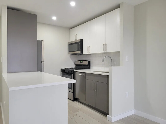 Photo - 129 E 95th St Apartments