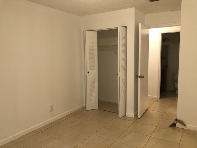 second room - 3380 Pinewalk Dr N Apartment Unit 1115