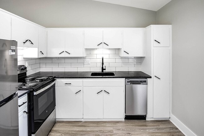 Photo - Top-Floor 2-Bedroom Apartment with Vaulted Ceilings! Unit 11