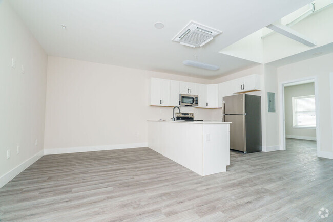 Building Photo - Riverwalk Apartments Unit 208