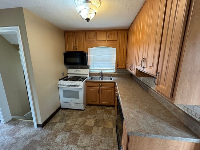 Photo - Charming 3 Bedroom Home With Fireplace and 2-Car Garage in Moline!