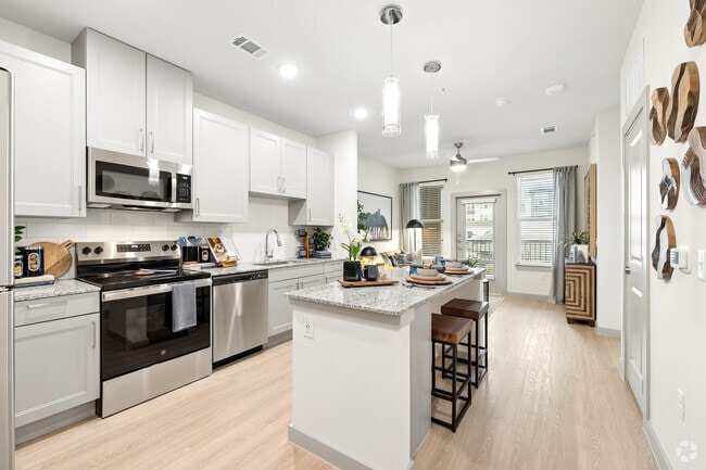 A1 1BR, 1BA - 638SF - Kitchen/Dining Area - Aspire at Greenville