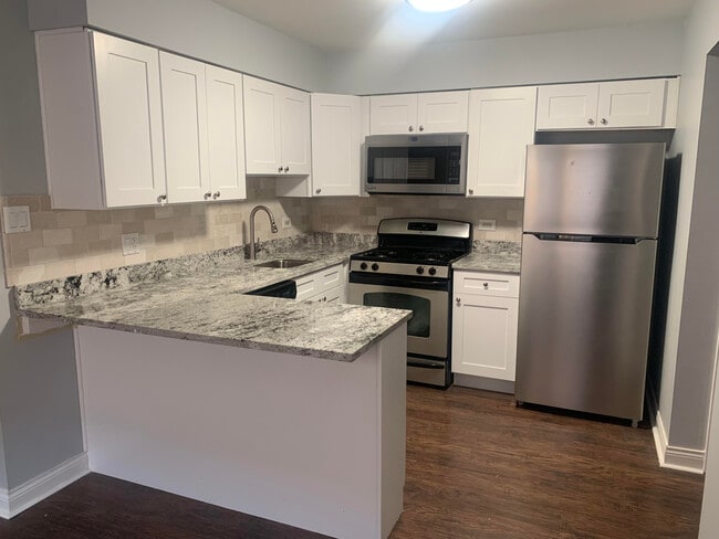 Building Photo - 4505 Maple Ave Unit 3