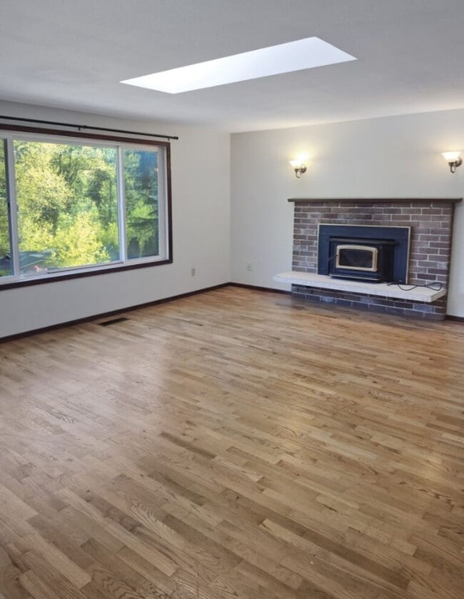 Photo - Split-Level Stunner with Skylight, Hardwoods & Room to Grow