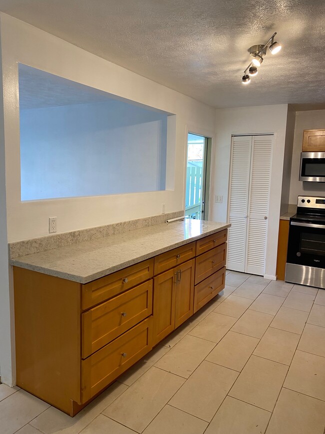 Opens to Living Room for easy entertaining - 1594 Kaunala Pl