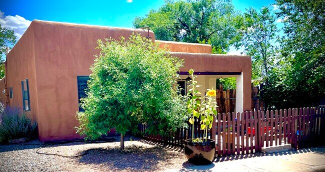 Enjoy a fenced in front yard and covered patio - 321 Tesuque Dr House