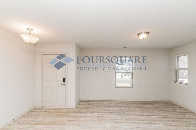 Photo - Spacious 3-Bed / 2.5-Bath Townhome with Open Floor Plan & Assigned Parking – Convenient to Downto...