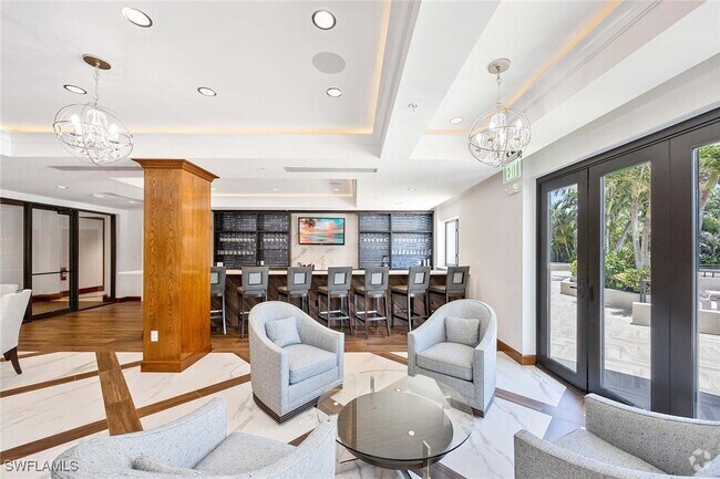 Building Photo - 6075 Pelican Bay Blvd Unit 906 Rental