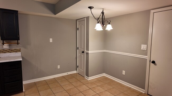 Photo - Spacious 2-Bed Townhome with Finished Basement, Pond View & Attached Garage in Fairfield