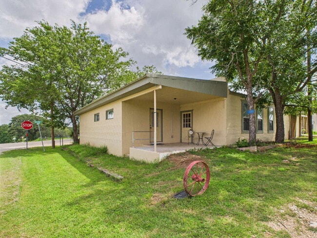 Building Photo - "Charming Furnished 1/1 in Stonewall, TX" Unit A Rental
