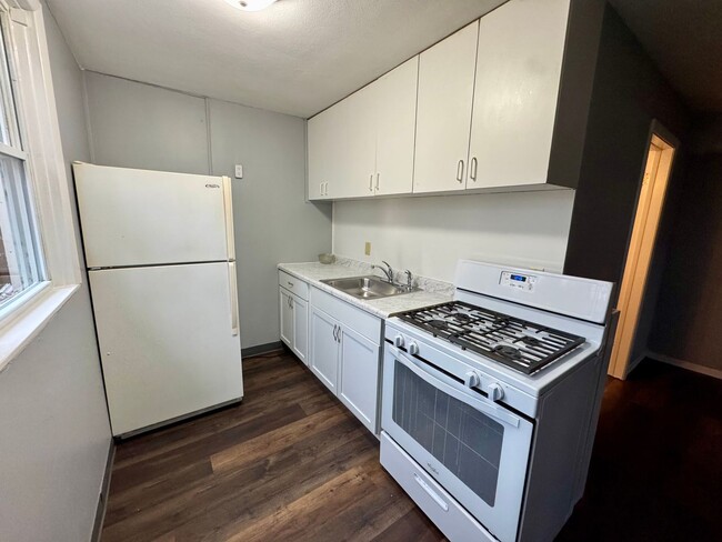 Photo - 1 Bed / 1 Bath • All Utilities Included • Private Entrance Unit Apartment 9