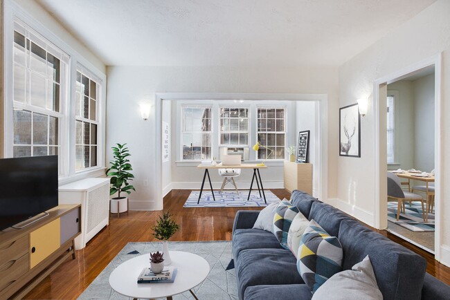 Living and sunroom (virtually staged)