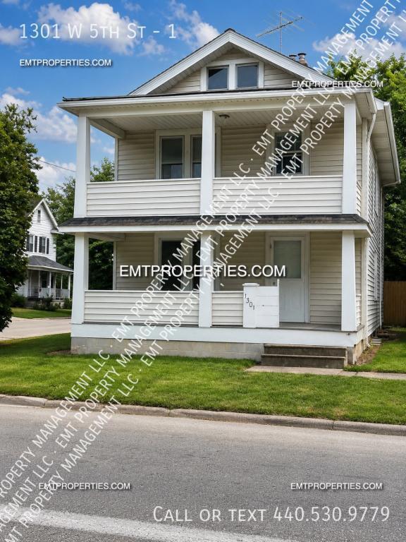 Building Photo - 1301 W 5th St Unit 1