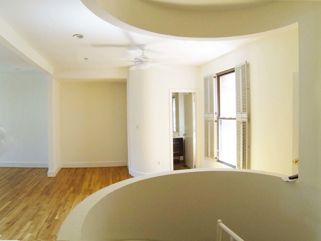 Dining area, powder room from stairs - 1318 35th St NW Unit 2
