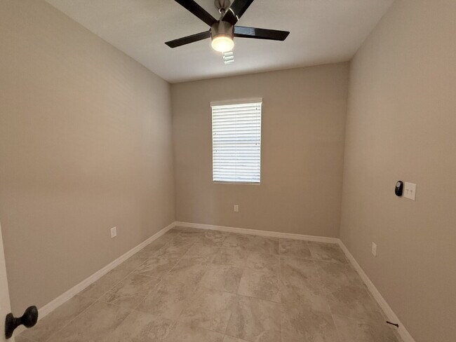 Photo - Spacious 4-Bedroom Retreat with additional office/den in the Heart of Trinity!