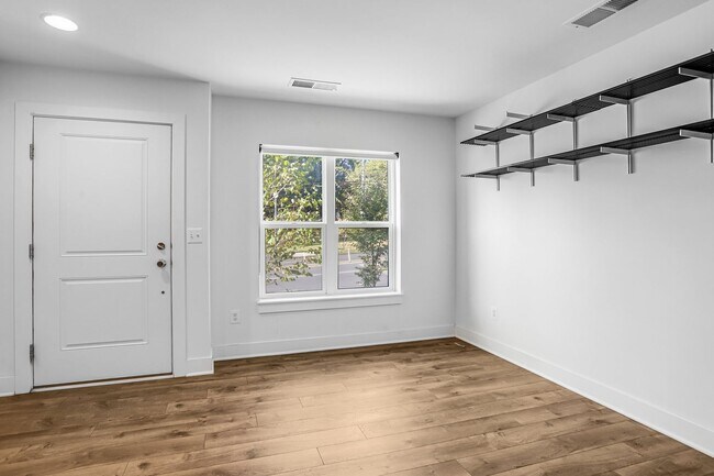 Photo - Spacious 4-level Home| 3 bedrooms + Garage parking!