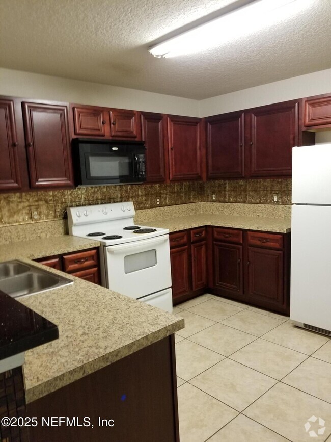Building Photo - 6965 Ortega Woods Dr Unit 10 Rental