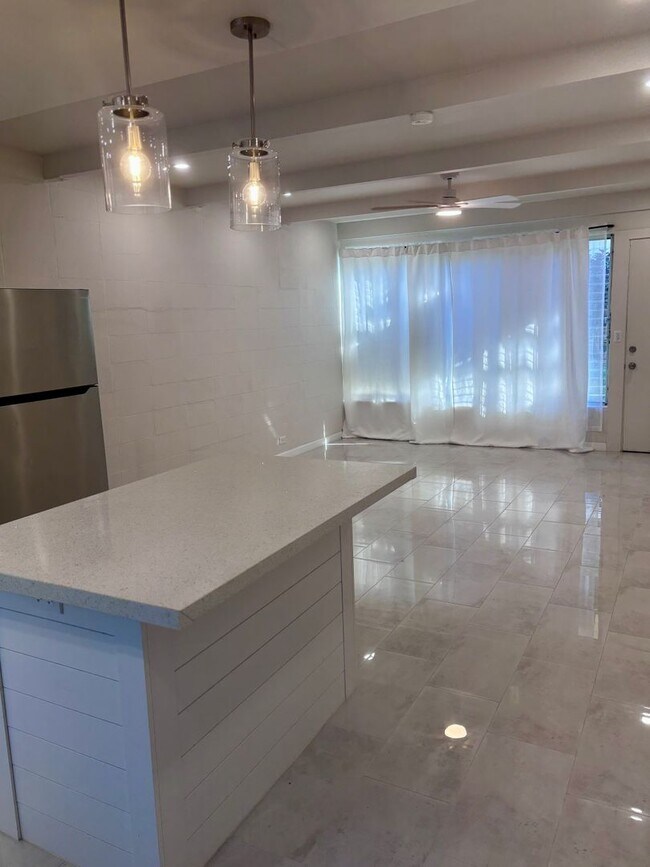 Photo - Available Now | 2 Bedroom, 2 Bathroom Townhouse with 1 Assigned Parking Stall at Tropic Gardens 1