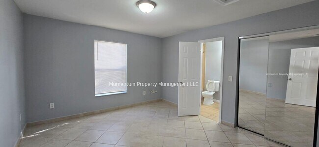 Photo - Spacious 3-Bedroom, 2-Bath Home with Covered Screened Porch & Large Kitchen in Tampa