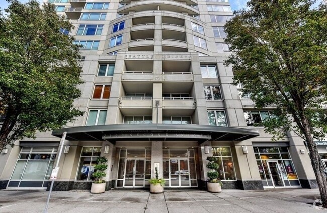 Building Photo - 1 Bedroom Condo with  24 Hour Concierge in...