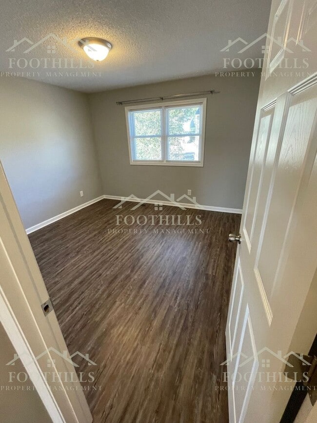 Photo - 2-Bedroom Home with Fenced Backyard and Ap...