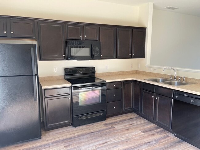 Photo - Spacious Duplex close to schools and shopping. Move in mid-June