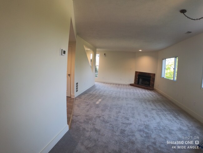 Living room & combination dining room (fireplace is decorative) - 3137 Josephine St Apartments Unit 2