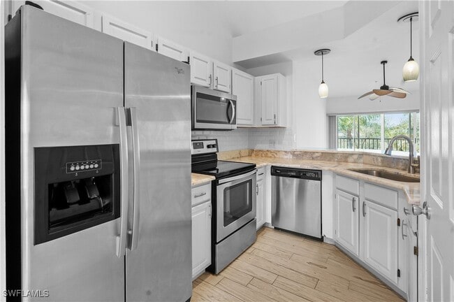 Building Photo - 9851 Costa Mesa Ln Unit 309 Rental