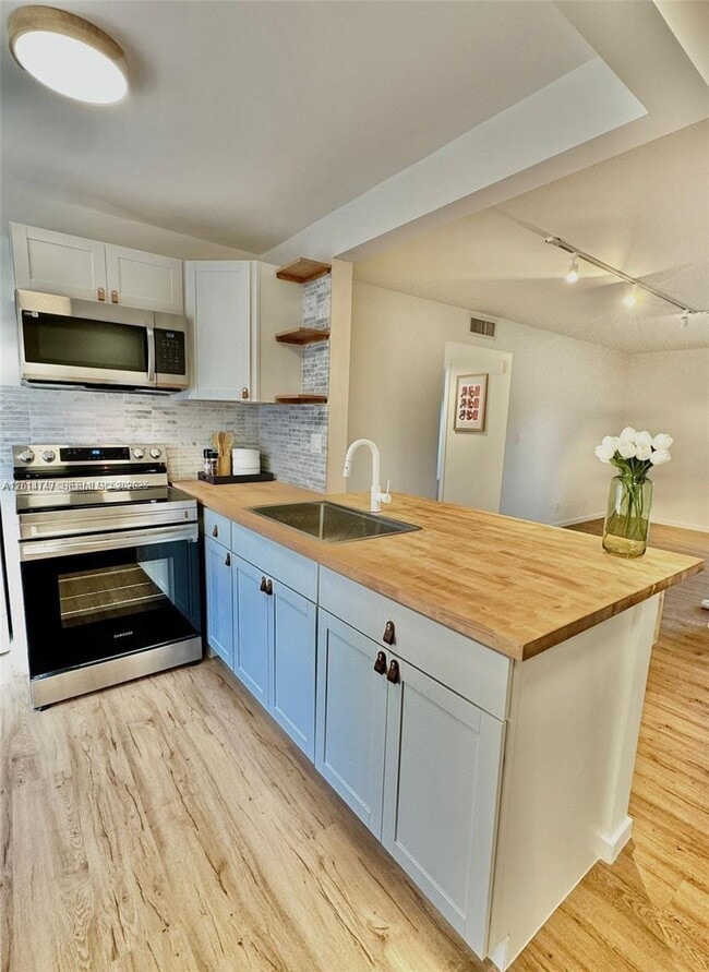 Photo - 715 Gardens Dr Unit 103