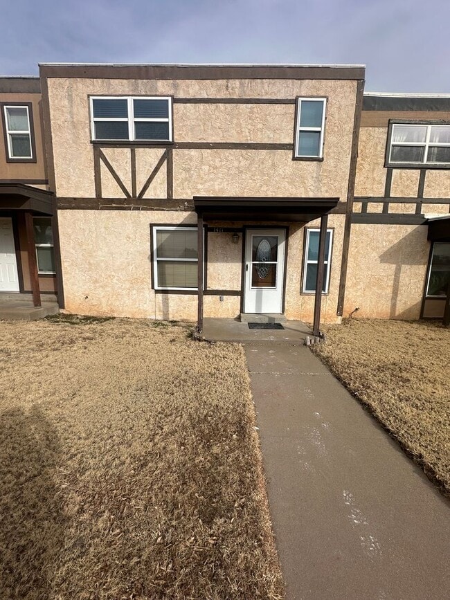 Building Photo - Spacious 2 Bed Condo! Fully Fence Backyard with a 1 Car Garage!