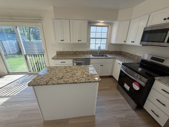 New cabinets, flooring, appliances - 903 Harwood Rd